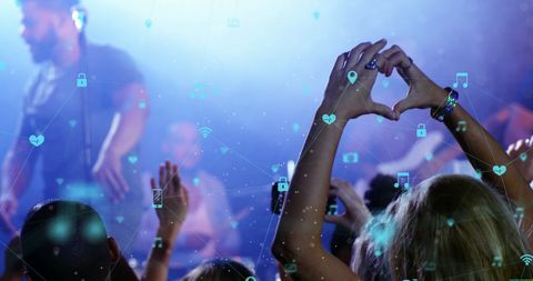 Diverse Crowd Enjoying Concert with Heart Gesture and Digital Icons - Download Free Stock Images Pikwizard.com