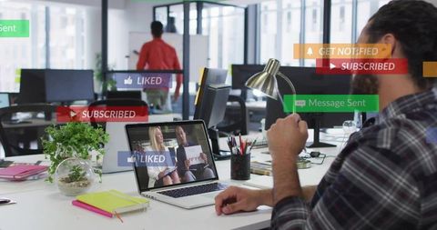 Businessman Engaging with Online Coliseagues in Modern Office Interior
