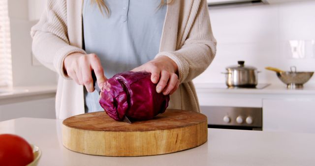 Woman Preparing Purple Cabbage in Modern Kitchen - Download Free Stock Images Pikwizard.com