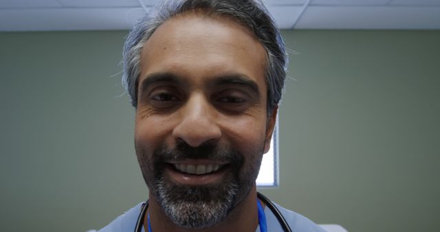 Smiling Male Doctor in Hospital Room - Download Free Stock Images Pikwizard.com