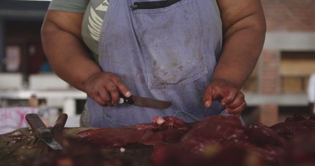 Butcher Cutting Fresh Meat at Market - Download Free Stock Images Pikwizard.com