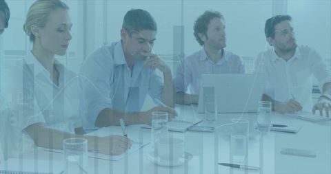 Diverse Team Collaborating in a Financial Meeting with Data Overlay - Download Free Stock Images Pikwizard.com