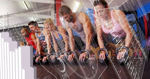 Performing group plank workout using push-up handles with digital fitness hud overlays