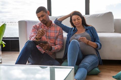 Diverse Women Using Tablet for Online Shopping at Home