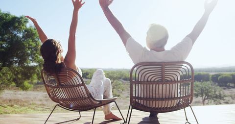 Joyful Couple Relaxing Outdoors Enjoying Sunny Day