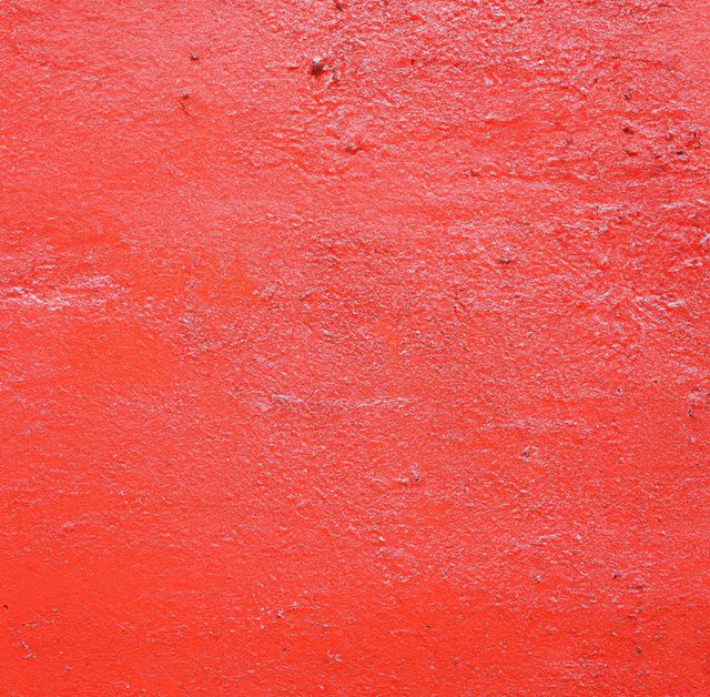 Close up of red wall created using generative ai technology. Texture, colour and pattern concept, digitally generated image.
