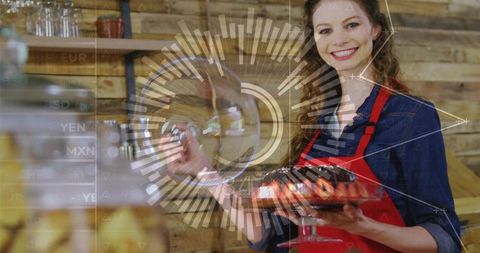 Smiling barista presenting pastry under glass dome at rustic cafe counter with hud overlay