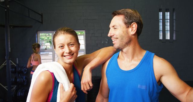 Happy Couple at Gym Relaxing After Workout - Download Free Stock Images Pikwizard.com