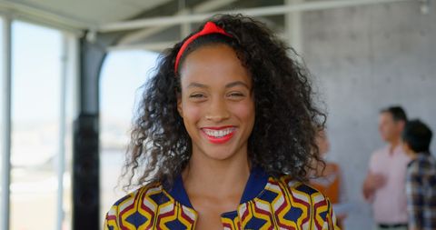 Confident female business executive in modern office