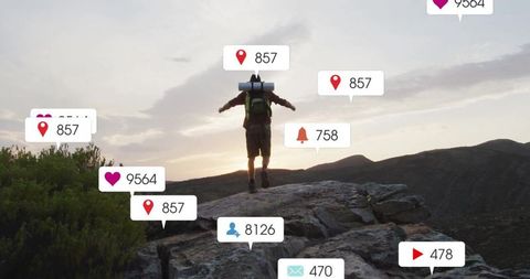 Hiker Embracing Sunset Amidst Social Media Notifications