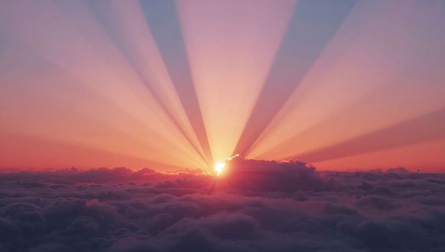 Radiant Sunrise with Sun Beams Above Cloud Layer