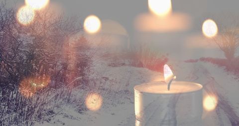 Candle Light Over Snowy Winter Road Creating Festive Ambiance - Download Free Stock Images Pikwizard.com