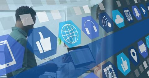 Team brainstorming with digital interface symbols in modern office