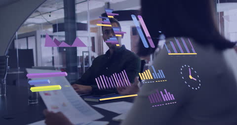 Diverse Team Analyzing Financial Data with Digital Graphics