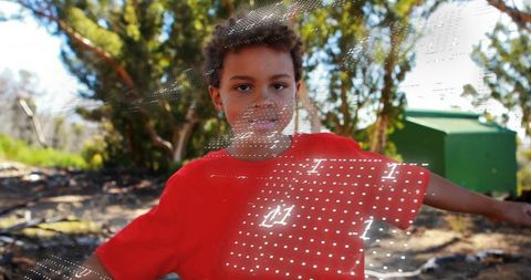 Balancing boy in nature with futuristic overlay