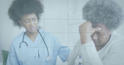 Compassionate Nurse Comforting Senior Woman on Couch