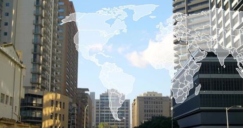 Transparent world map overlay hovering over urban skyline for global business
