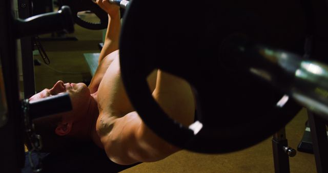 Determined Man Lifting Weights in Gym Workout - Download Free Stock Images Pikwizard.com