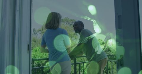 Senior Couple Enjoying Peaceful Balcony View