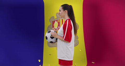 Female Soccer Player Holding Ball Against Moldovan Flag - Download Free Stock Images Pikwizard.com