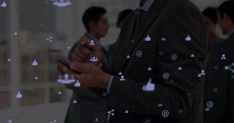 Businessman Interacting with Digital Social Media Icons