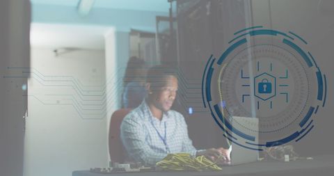 Cybersecurity specialist analyzing data in high-tech data center