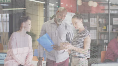 Diverse Team Analyzing Financial Data on Tablet