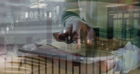 Tapping tablet with financial charts overlay for mobile trading and data analysis