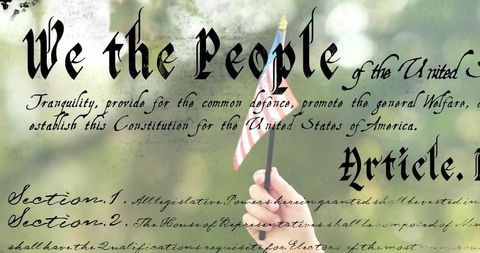 Child holding us flag with constitution text overlay