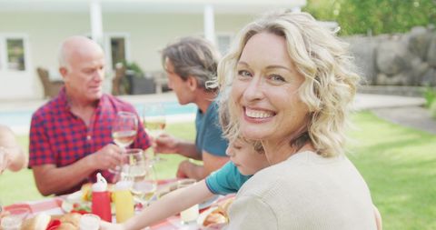Joyful Family Breakfast in Garden Reception Outdoors - Download Free Stock Images Pikwizard.com