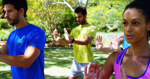 Group Practicing Tai Chi Outdoors on Sunny Day - Download Free Stock Images Pikwizard.com