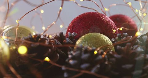 Festive Christmas Baubles with Lights and Pine Cones - Download Free Stock Images Pikwizard.com