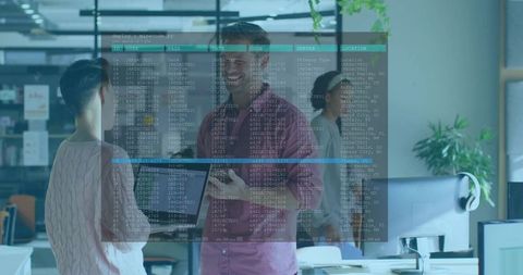 Leader presenting software roadmap to team in modern open-plan office with code projection