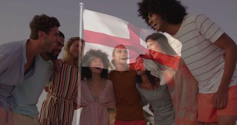 Group Celebration on Hilltop with England Flag
