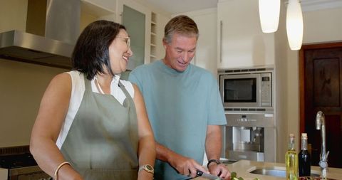 Senior Couple Cooking Together, Kitchen Bonding Activity