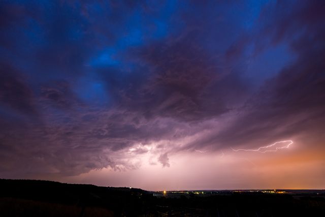 Dramatic Evening Thunderstorm with Lightning over Cityscape - Download Free Stock Photos Pikwizard.com