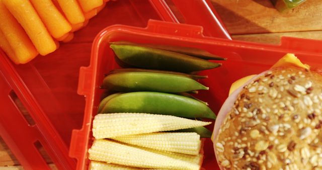 Packed Healthy Vegetarian Lunch with Sandwich, Baby Corn, Snap Peas, and Carrots - Download Free Stock Images Pikwizard.com