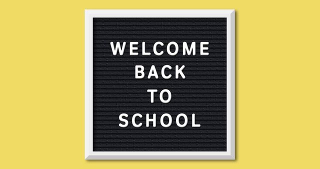 Welcome Back to School Message on Black Letter Board with Yellow Background - Download Free Stock Images Pikwizard.com