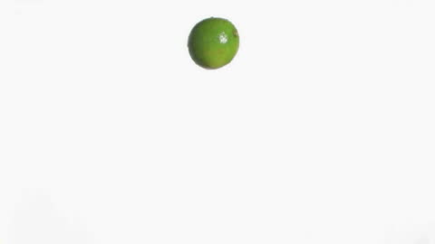 Floating Lime Against a White Background