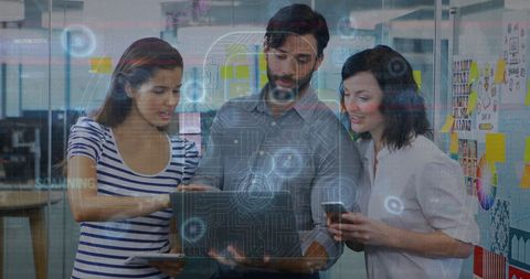 Coworkers Discussing Digital Security with High-Tech Overlay - Download Free Stock Images Pikwizard.com
