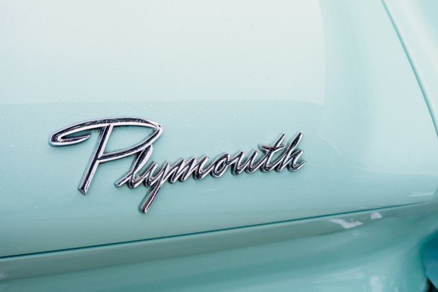 Close-Up of Plymouth Logo on Vintage Car - Download Free Stock Photos Pikwizard.com