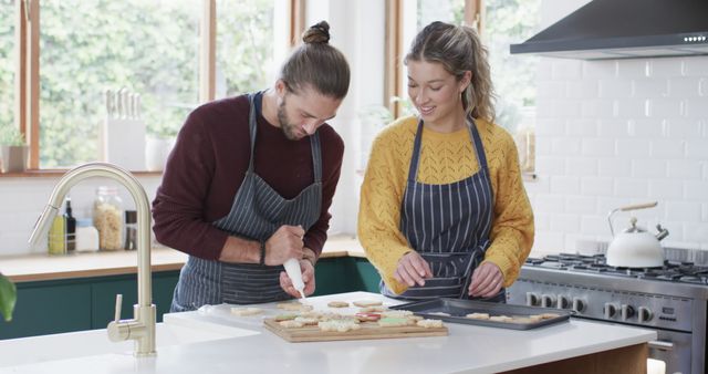 Young Couple Preparing Fresh Homemade Cookies in Bright Modern Kitchen - Download Free Stock Images Pikwizard.com