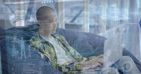 Man with Laptop in Modern Tech-Driven Workspace