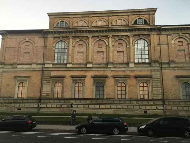 Historic European Building with Cars Parked on Street - Download Free Stock Images Pikwizard.com