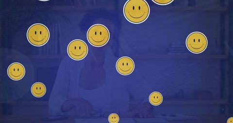 Smiling Emojis Over Biracial Woman in Video Call, Global Connection Concept