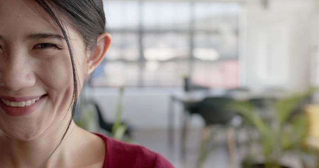 Smiling Woman Close-Up in Modern Office Setting - Download Free Stock Images Pikwizard.com