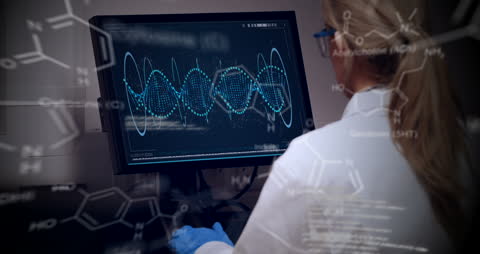 Scientist Analyzing DNA Data on Computer Screen