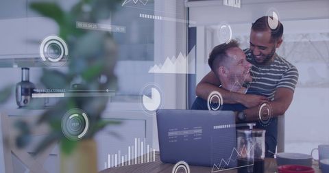 Interracial Couple Analyzing Financial Data on Laptop with Digital Interface