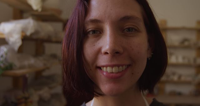 Smiling Woman with Short Hair in Workshop - Download Free Stock Images Pikwizard.com