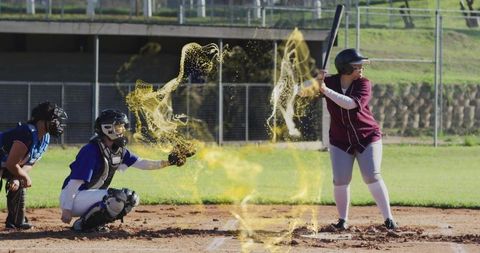 Swinging Batter with Magical Golden Mist Surrounding at Home Plate